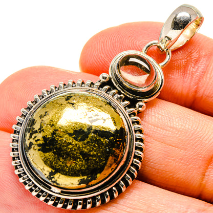 Round citrine agate pendant with gold-and-green speckled stone, sterling silver bezel.