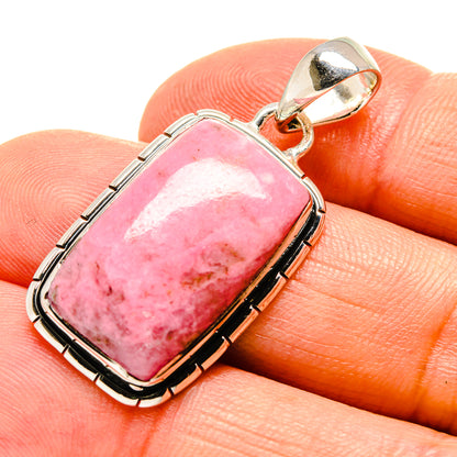 Pink opal rectangular pendant in sterling silver with raised bezel and bail