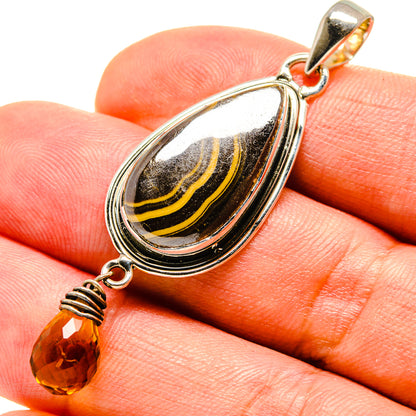 Citrine teardrop pendant, 925 sterling silver bezel with faceted amber bead detail