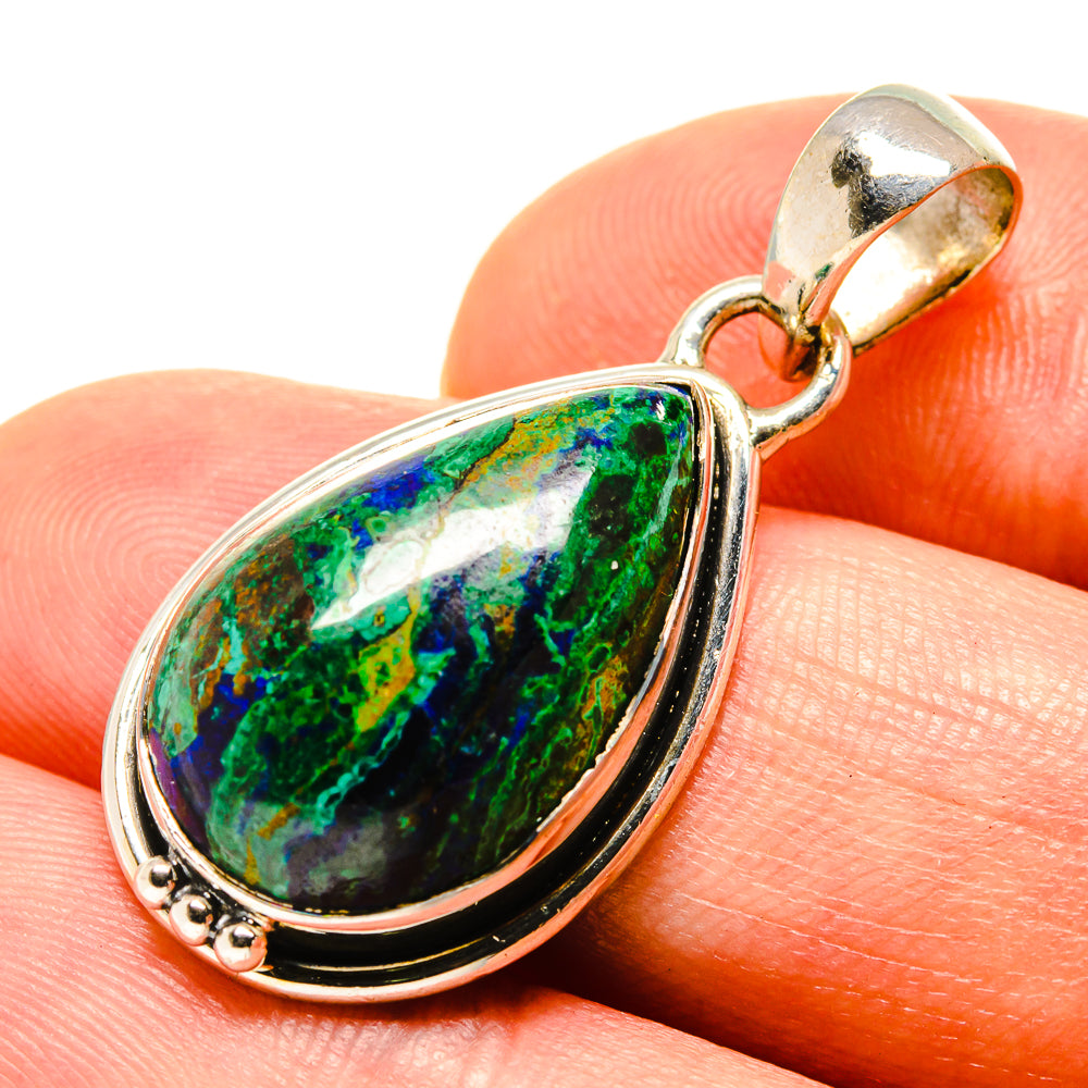 Teardrop chrysocolla-malachite stone pendant with blue-green color in sterling silver bezel