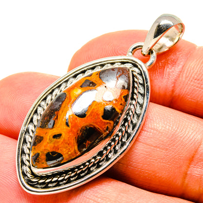 925 sterling silver bauxite oval pendant with orange and black stone