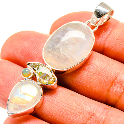 Opalescent oval pendant in 925 sterling silver with small green opal and yellow crystal