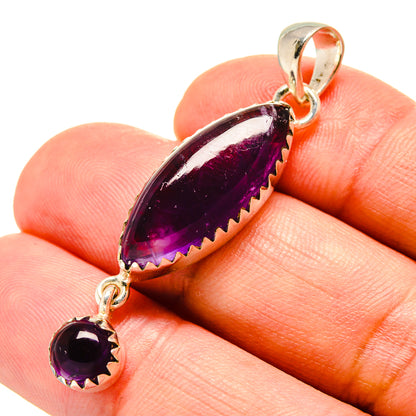 Amethyst pendant with purple teardrop and round stones in sterling silver bezel links