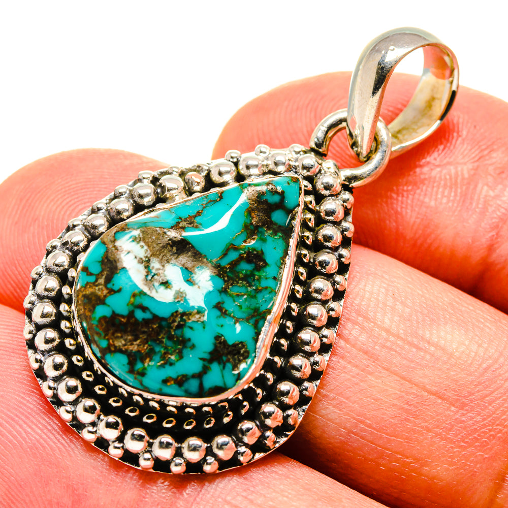 Turquoise teardrop pendant in 925 sterling silver, close-up on beaded frame