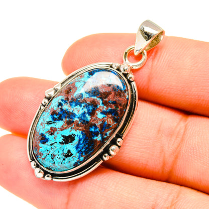 Oval shattuckite gemstone pendant in 925 sterling silver bezel with bail