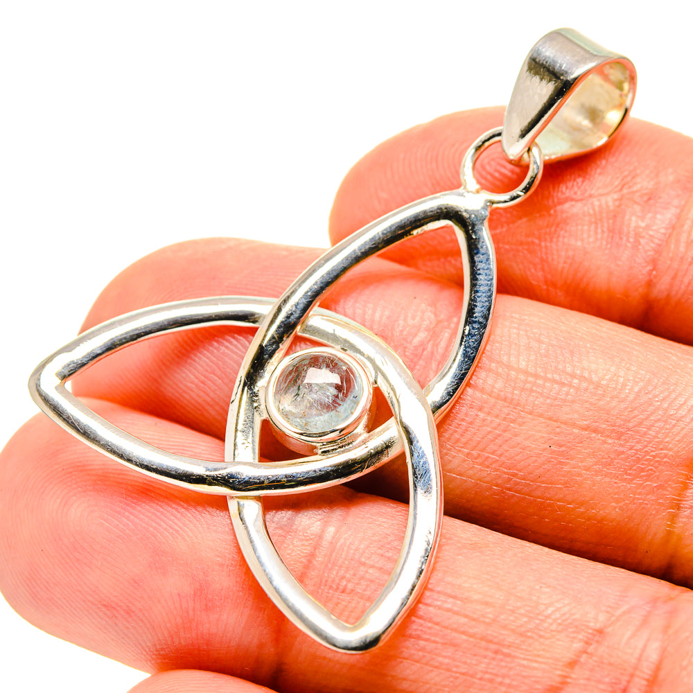 Aquamarine gemstone pendant close-up in 925 sterling silver with loop bail