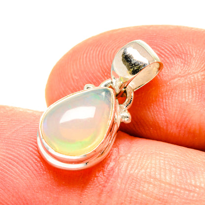 Sterling silver opal pendant with teardrop Ethiopian opal stone in bezel setting