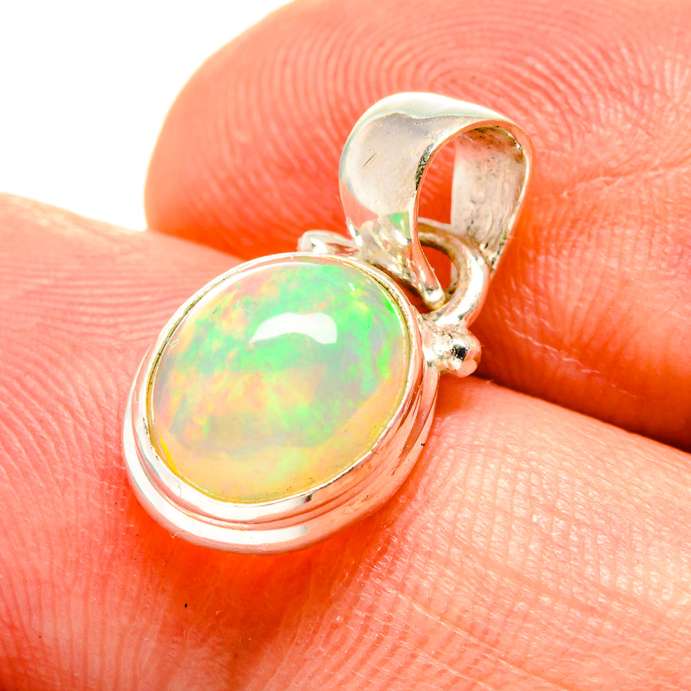 Oval Ethiopian opal pendant, 925 sterling silver setting, green-yellow opal cabochon close-up