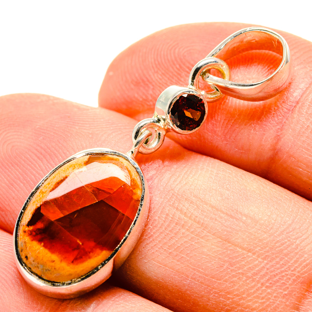 Oval fire opal and round garnet pendant, silver-tone prong setting
