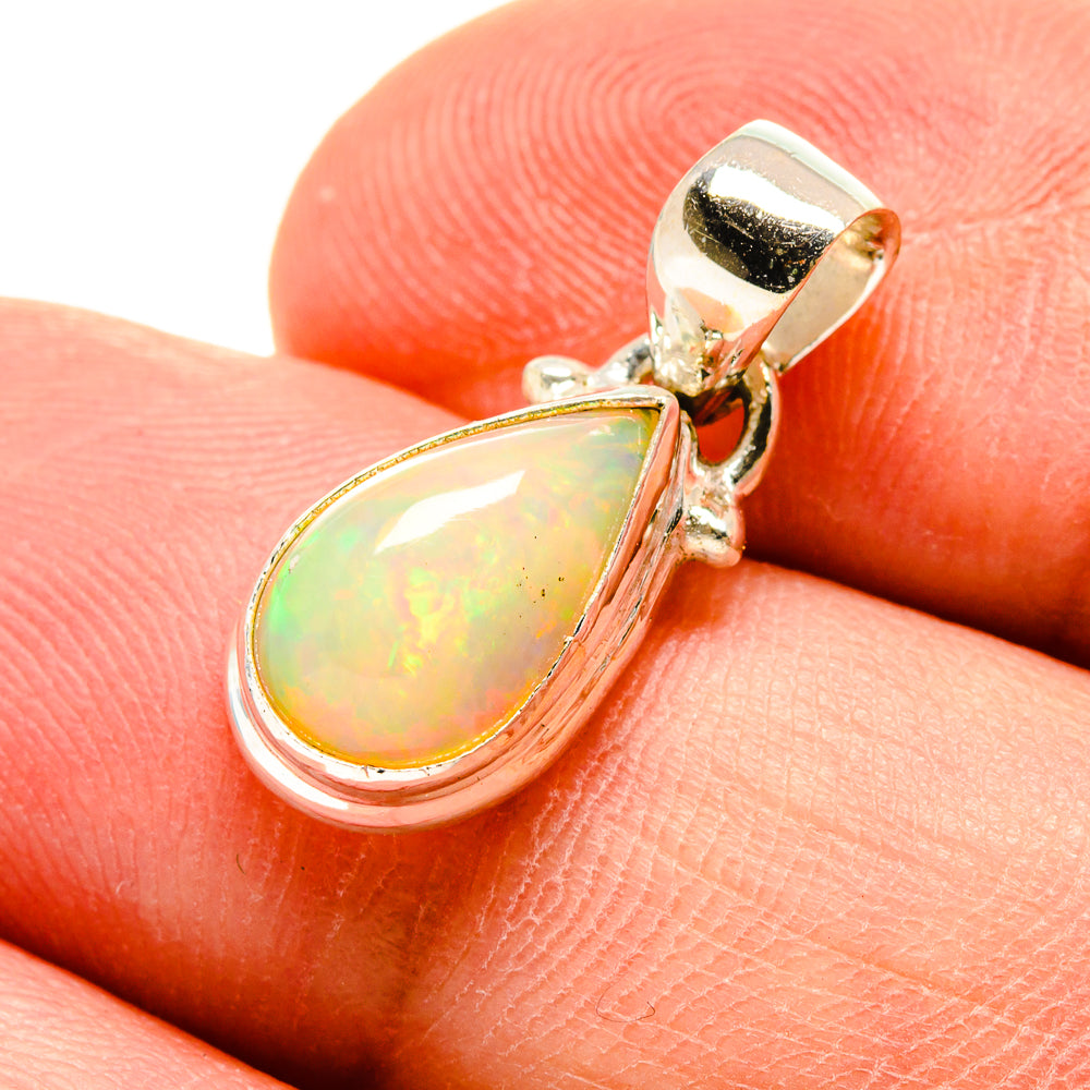 Sterling silver teardrop opal pendant with prong-set Ethiopian opal