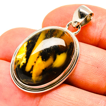 Jasper pendant in 925 sterling silver with oval amber, black, and gold-striped stone