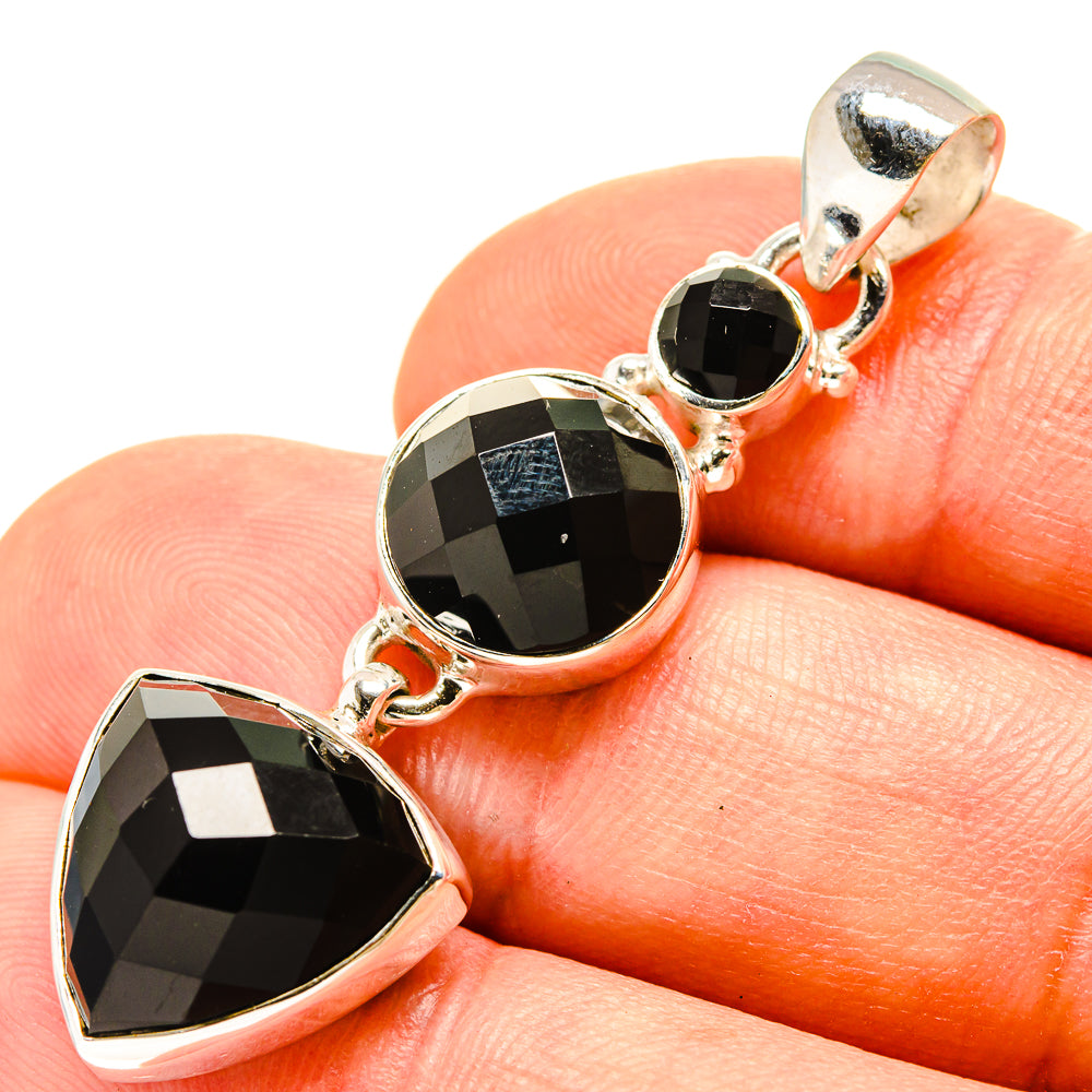 Sterling silver heart onyx pendant with three faceted black stones
