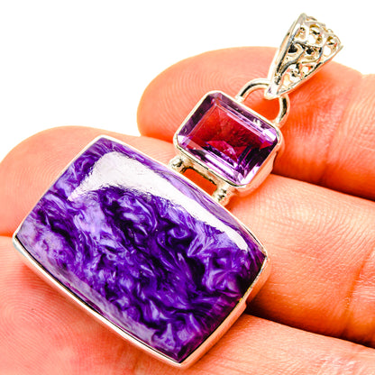 Amethyst gemstone pendant with large purple rectangular stone and small top amethyst