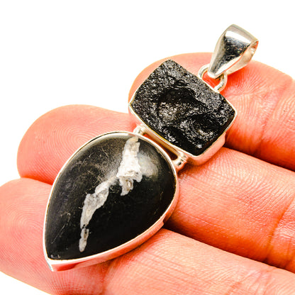925 sterling silver pendant with black stone, white crystal inclusions, top bail