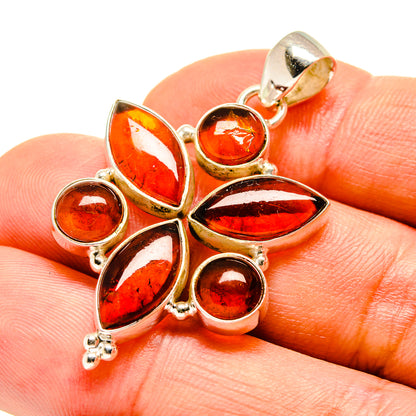 Amber pendant in sterling silver with marquise and round cabochon stones, leaflike star shape