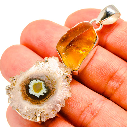 Sterling silver citrine pendant on hand, yellow crystal and geode slice centerpiece