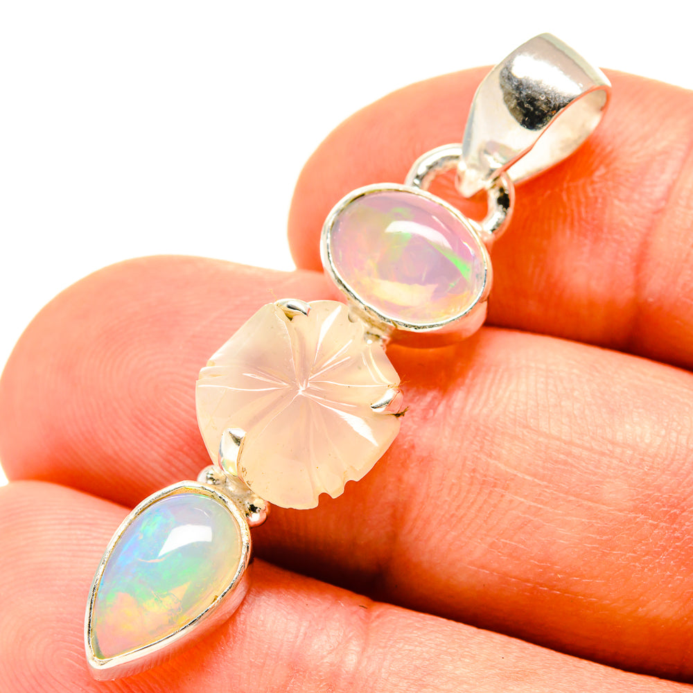 Sterling silver pendant with oval opal and round moonstone, prong-set with etched center