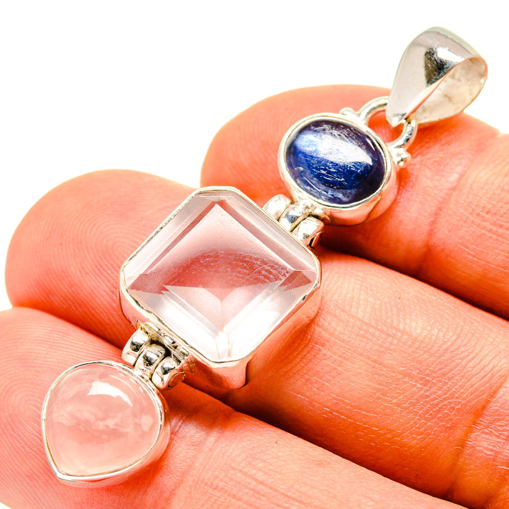 Sterling silver pendant closeup with blue oval, clear square, pink round stones