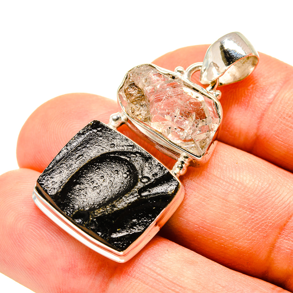 Sterling silver pendant with clear faceted crystal and black tektite stone, square bezel