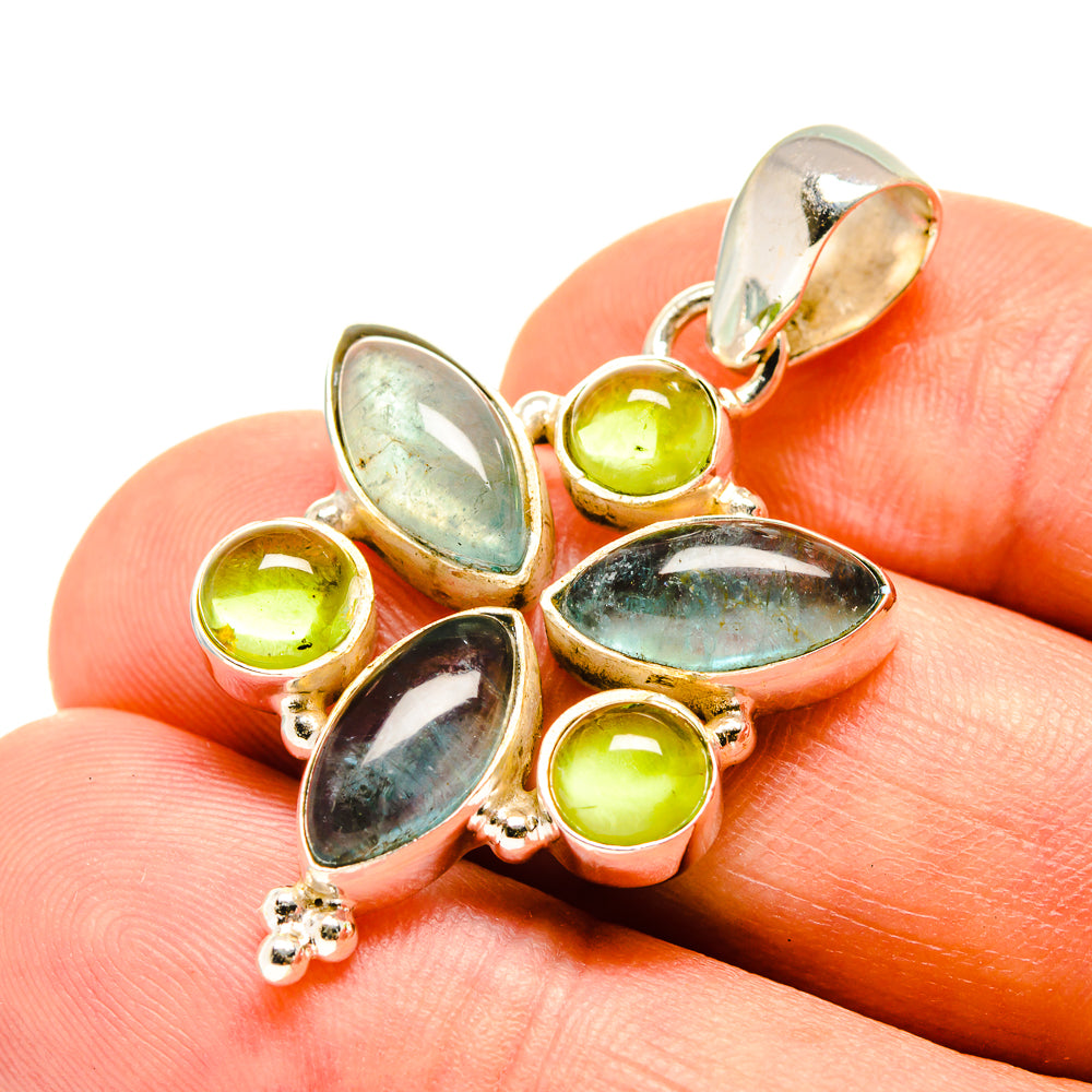 Sterling silver pendant with blue fluorite and peridot green stones, leaf and round shapes