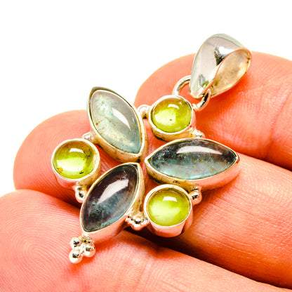 Sterling silver pendant with blue fluorite and peridot green stones, leaf and round shapes