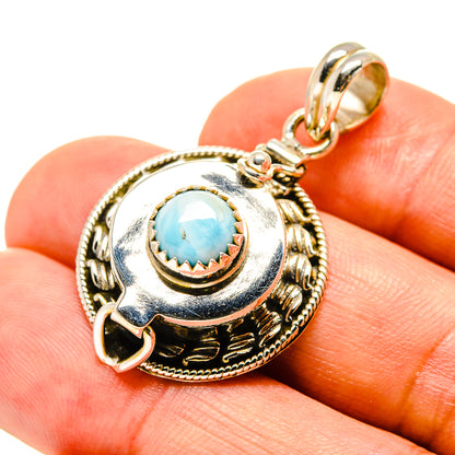 Larimar pendant in 925 sterling silver with blue cabochon and decorative round bezel