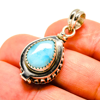 Sterling silver Larimar pendant with pear-shaped blue stone and bail loop