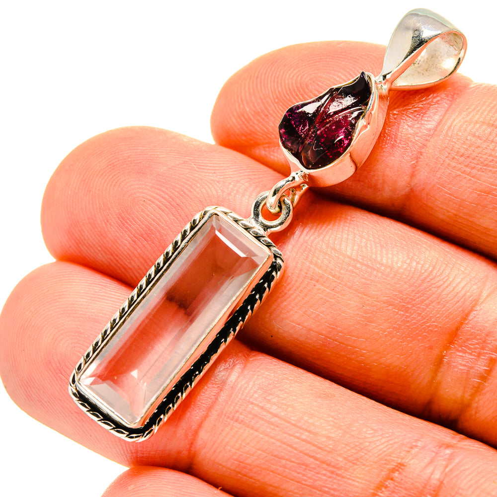 Sterling silver rose quartz and garnet pendant close-up with faceted stones