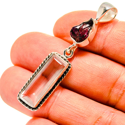 Sterling silver rose quartz and garnet pendant close-up with faceted stones