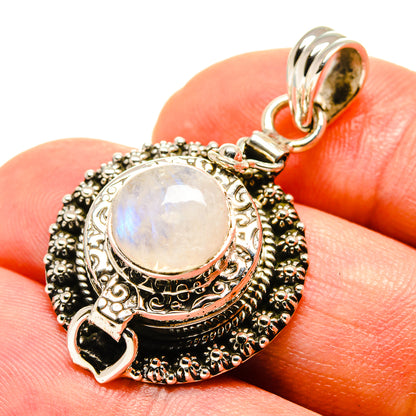 Sterling silver moonstone pendant with oval rainbow stone and ornate beaded frame