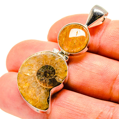 Rutilated quartz and fossil pendant with amber round stones, sterling silver prong setting