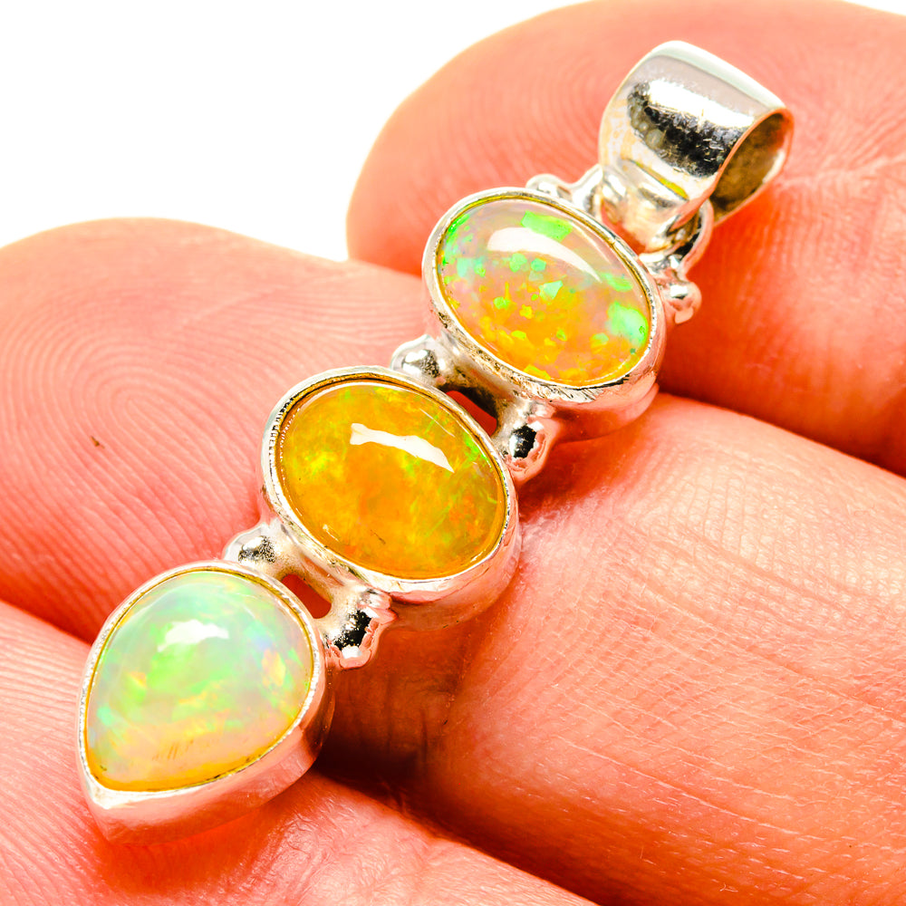 Ethiopian opal pendant in 925 sterling silver with three oval opals, yellow and green