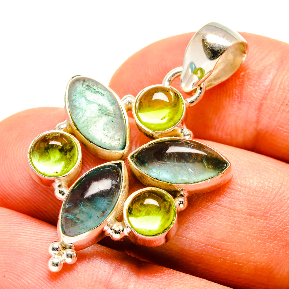 Sterling silver pendant detail with blue-green fluorite ovals and peridot green rounds