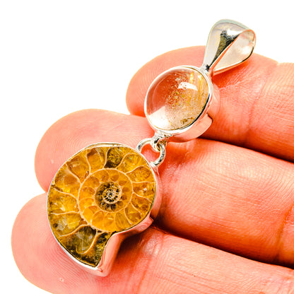 925 sterling silver pendant with yellow-orange ammonite fossil and oval rutilated quartz