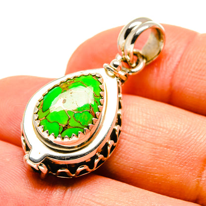 Green turquoise teardrop pendant in sterling silver bezel with loop bail