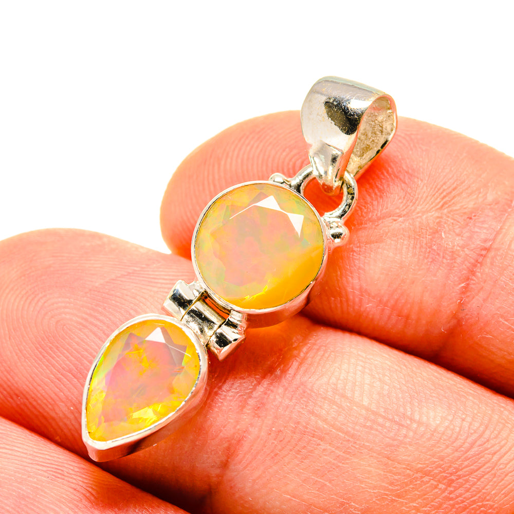 Sterling silver opal pendant close view with oval and teardrop faceted yellow gemstones