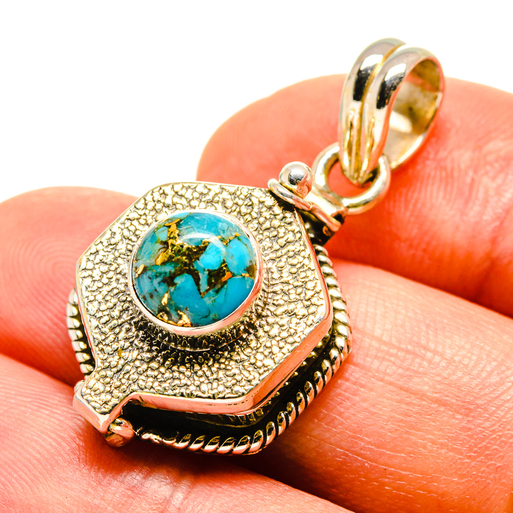 Turquoise poison pendant charm with textured gold-tone bezel and ornate bail