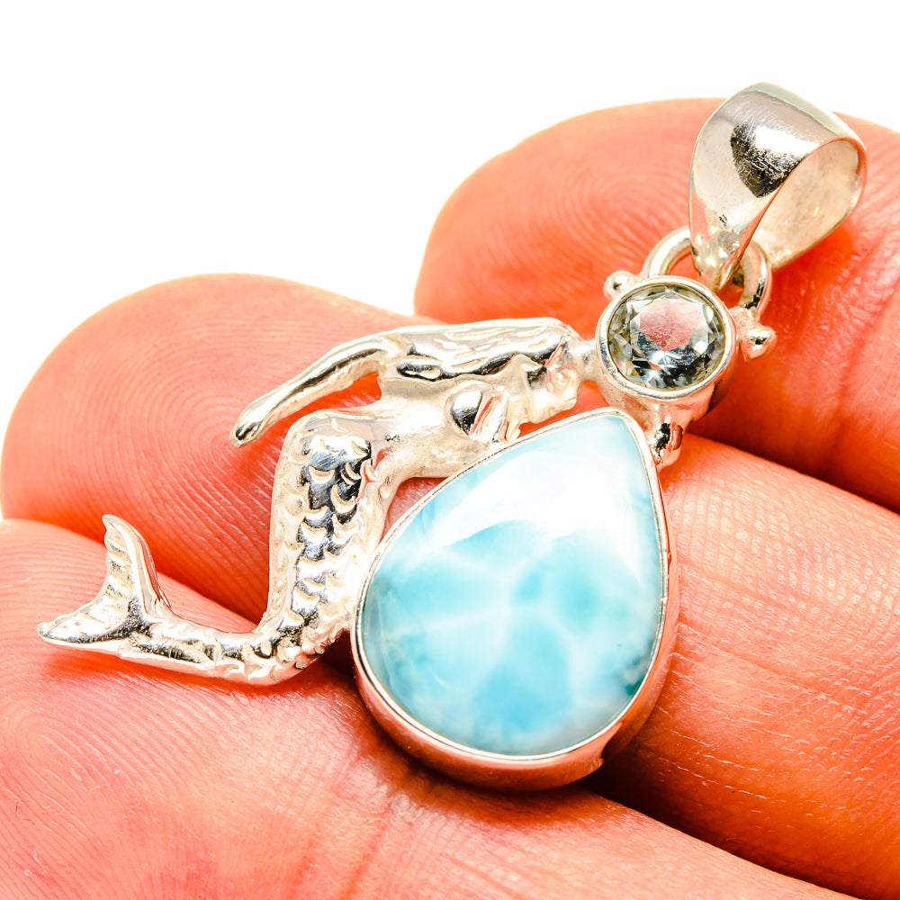 Sterling silver mermaid pendant, teardrop larimar with small round blue stone