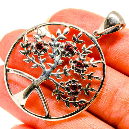 Tree of life pendant in sterling silver with red garnet gemstone cabochons