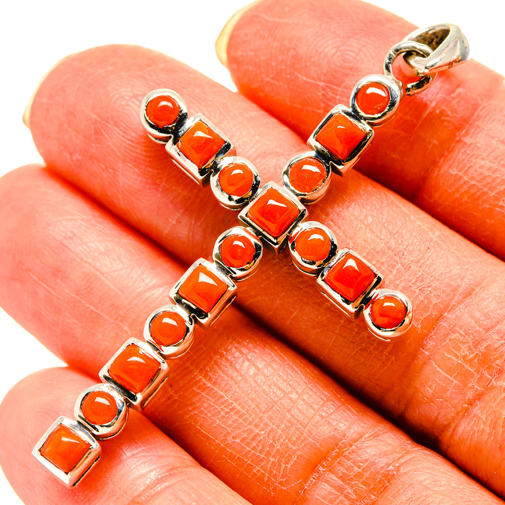 Carnelian cross pendant in 925 sterling silver with orange-red square and round stones