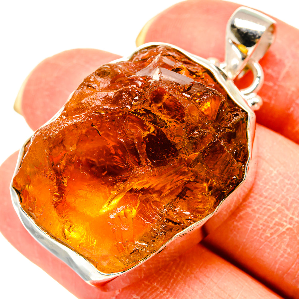 Rough citrine pendant with orange-brown stone in 925 silver bezel and loop bail