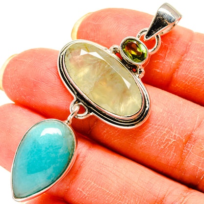 Sterling silver pendant with oval green and turquoise gemstone cabochons, peridot accents