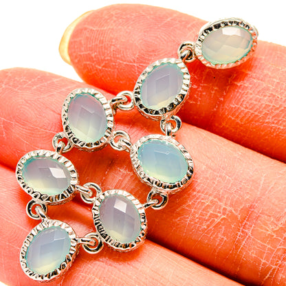 Aqua chalcedony pendant with close oval opalescent stones in silver settings
