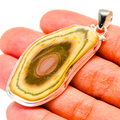 Oval yellow-green jasper pendant with polished 925 sterling silver bail