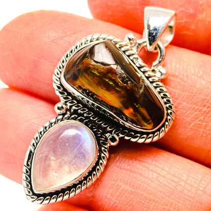 Sterling silver pendant with oval fire agate and pink moonstone, close-up