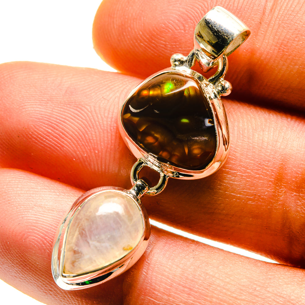 925 sterling silver pendant with amber teardrop and opalescent pear-shaped stone