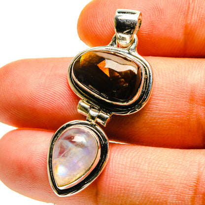 Sterling silver pendant with amber fire agate and iridescent moonstone cabochons