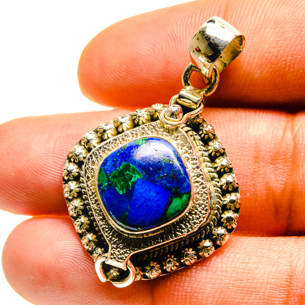 Sterling silver azurite pendant with blue cabochon stone and detailed frame bail