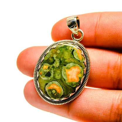 Rainforest jasper pendant in oval 925 sterling silver bezel with orange inclusions