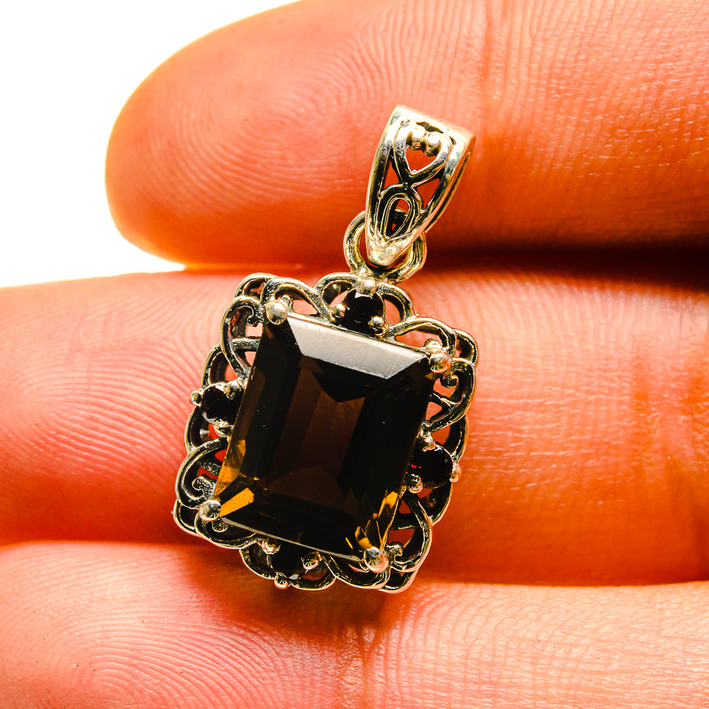 Sterling silver pendant with dark cushion smoky quartz, ornate filigree and red accents